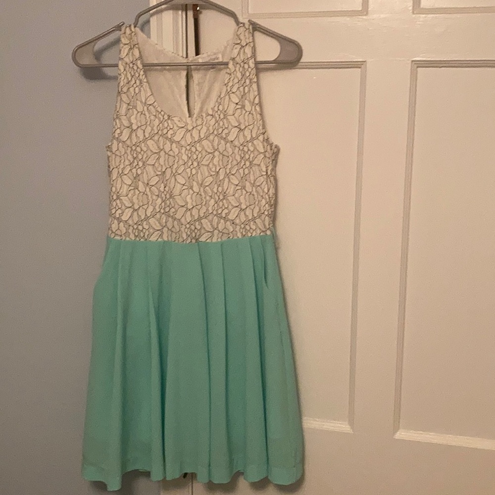 Turquoise dress with pockets